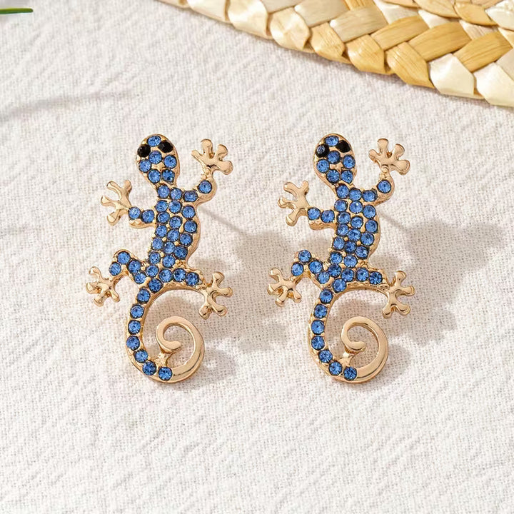 Gecko-øredobber med lykkeamulet – gratis ring | Begrenset tilbud