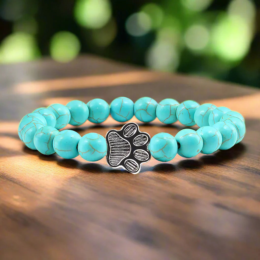 Tassunjäljen armbånd, dekorert med perler og delikat