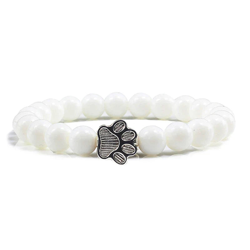 Tassunjäljen armbånd, dekorert med perler og delikat