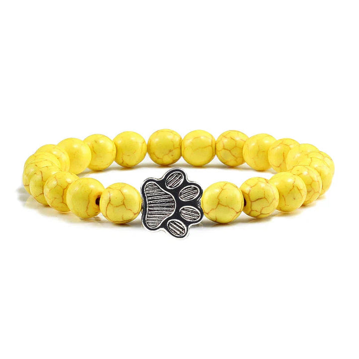 Tassunjäljen armbånd, dekorert med perler og delikat