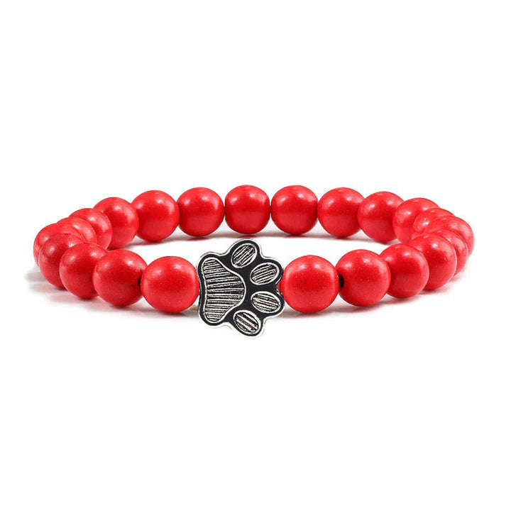 Tassunjäljen armbånd, dekorert med perler og delikat