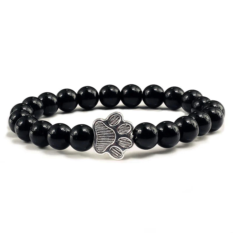 Tassunjäljen armbånd, dekorert med perler og delikat