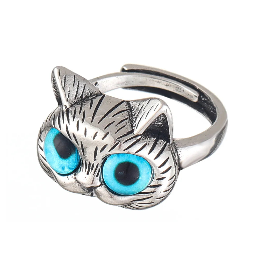 Leken ring med kattemotiv i blå detaljer